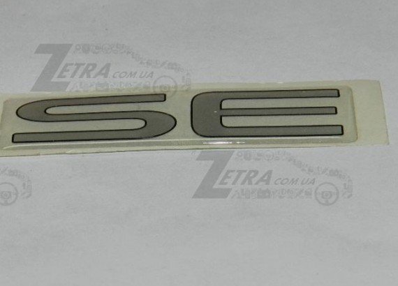 96250233 OEM Емблема "SE" на крило Ланос хром (OE)